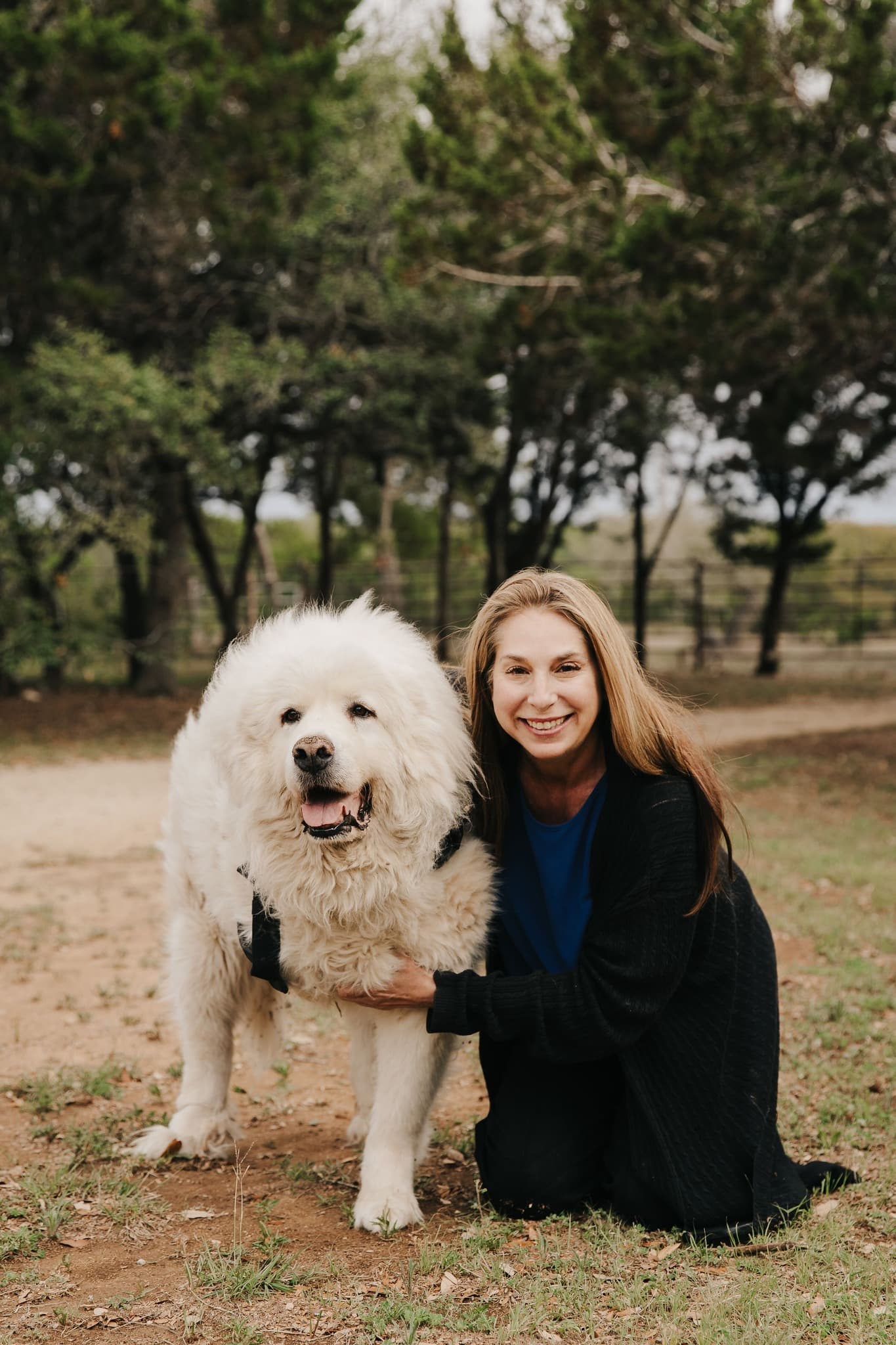 Laura with Henry, her Great Pyrenees